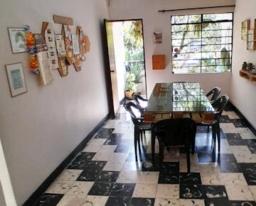 IVHQ typical volunteer hostel dining room in Colombia