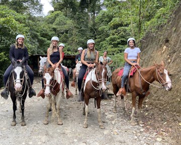 Volunteers horseback riding in Costa Rica with IVHQ