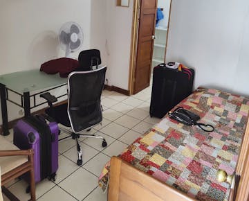 Volunteer accomodation bedroom at local homestay family with IVHQ at San Jose, Costa Rica