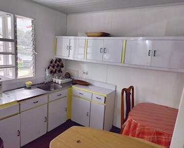 IVHQ accommodation homestay kitchen and dinning area in San Jose, Costa Rica