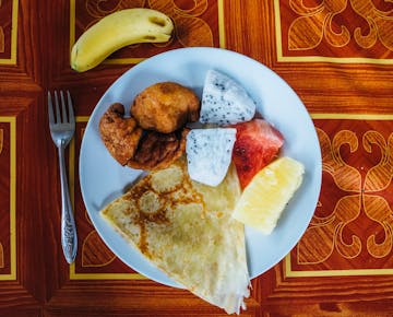 Volunteer Breakfast in Laos with IVHQ