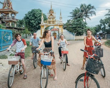 A group of IVHQ volunteers explore Vientiane by bike in Laos on the weekend