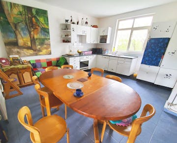 Volunteer accommodation dining area in Romania with IVHQ